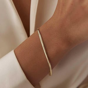 Pulseira espinha de peixe de ouro 14k: corrente minimalista de cobra