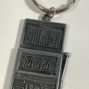Vintage Imperial Palace Las Vegas Strip Casino Hotel/Resort Slot Machine Pewter Keychain