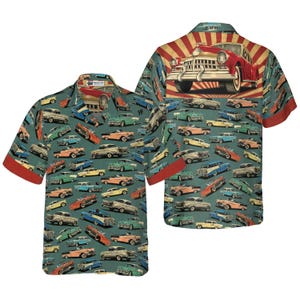 May include: Short-sleeved button-up shirt with a teal background and a pattern of vintage cars in various colors. The shirt features a red collar and cuffs. The back of the shirt has a large graphic of a red classic car with a sunburst design.