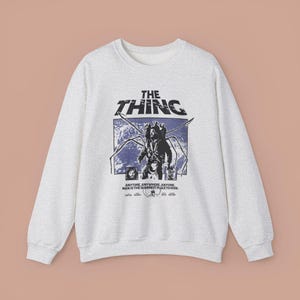 Vintage 'The Thing' Movie Sweatshirt: Retro Sci-Fi Crewneck