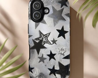May include: A smartphone case with a black and white star pattern. The case features a variety of star shapes and sizes, with a textured background. The phone case has a black border and a camera cutout.