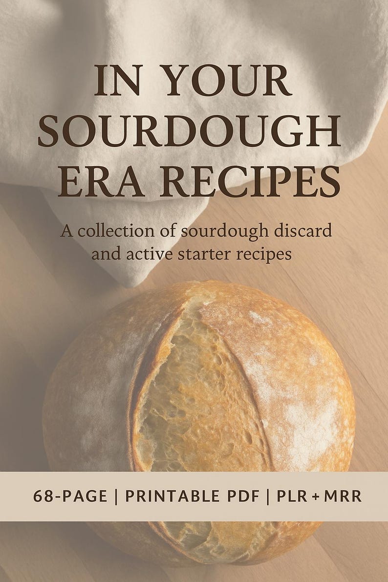 Puede incluir: Portada de libro de cocina con el t&iacute;tulo "IN YOUR SOURDOUGH ERA RECIPES" en texto marr&oacute;n. Debajo, se lee "A collection of sourdough discard and active starter recipes". Una hogaza de pan en primer plano. El libro es un PDF imprimible de 68 p&aacute;ginas.