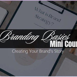 May include: A digital product advertisement featuring a clipboard with the text "What is Brand Strategy?" and "Branding Basics Mini Course." The image includes a tablet and other stationery items, with the words "Creating Your Brand's Story."