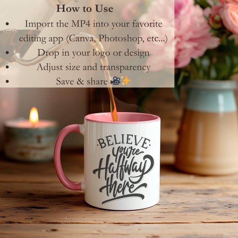 May include: White coffee mug with a pink handle and interior, featuring the text "BELIEVE you're halfway there" in a handwritten style. The image includes instructions on how to use the product, a candle, and a vase of flowers.