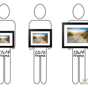 May include: Three black picture frames of different sizes, each holding a photograph of a beach scene with a sunset. The frames are held by three people, each standing in front of a white background. The frames are labeled with their dimensions: 11x14, 12x16, and 18x24.