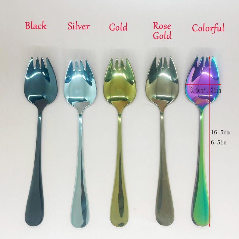 May include: Five spoons in black, silver, gold, rose gold, and colourful finishes. The colourful spoon measures 16.5 cm long and 3.4 cm wide. The spoons have a unique fork-like design on the spoon head.