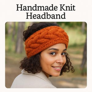 May include: An orange handmade knit headband with a cable knit design. The headband is worn by a person with curly dark hair. The text "Handmade Knit Headband" is at the top of the image.