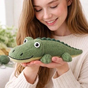 May include: A set of three ceramic mugs with a speckled, matte finish. The mugs are in shades of cream, light gray, and dark gray. Each mug has a simple, minimalist design, perfect for coffee or tea.