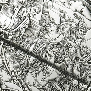 May include: Detailed black and white engraving depicting a classical scene with figures, horses, and chariots. The artwork features intricate linework and shading, creating a dramatic and historical aesthetic. The image is a close-up of a larger piece.