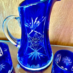Antique Carved Blue Crystal Pitcher and 6 Low Ball Glass Set