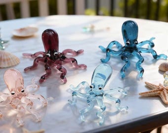 Un Groupe De Figurines De Pieuvre En Dessin Animé De Différentes Couleurs | Vecteur Premium