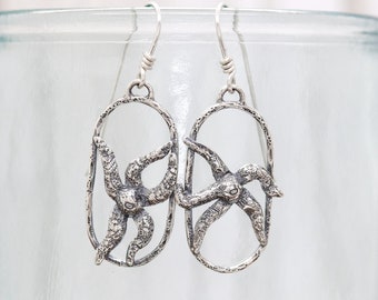 Ochre Sea Star small hoop sterling dangle earrings. Silversmith hand forged metalwork boho. jewelry Handmade