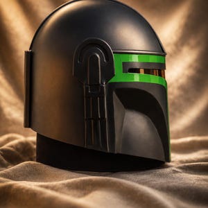 May include: A matte black helmet featuring a distinct T-shaped visor area accented with a vibrant green stripe. The helmet has a smooth, rounded dome and a structured side panel design with a vertical rectangular detail on the back section.