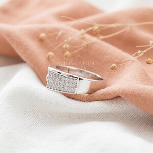 6mm Wide Band Width men's ring in 10k Solid Gold. High setting height with micro pave detailing. Bold statement piece for anniversary gifting and daily luxury wear.