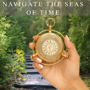 May include: A gold-colored pocket watch with Roman numerals and intricate detailing is held in a hand. The watch has a circular face and a decorative frame. The text "NAVIGATE THE SEAS OF TIME" is at the top of the image.