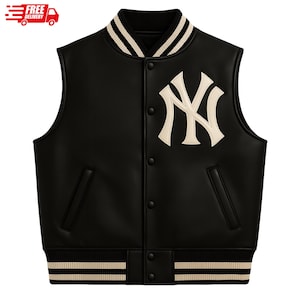 May include: Black sleeveless varsity jacket with the New York Yankees logo in cream. The jacket has a ribbed collar, cuffs, and hem with cream stripes. It has a button-up front and two front pockets.