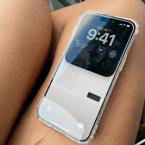 May include: A smartphone with a clear protective case displays the time as 9:41 AM on Wednesday, April 1st. The screen shows a weather forecast of partly cloudy with a high of 88 degrees Fahrenheit and a low of 64 degrees Fahrenheit.