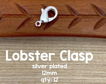 May include: Silver plated lobster clasp, 12mm in size.  Quantity of 12 clasps.  Avalon Beads.