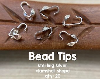 May include: Twenty sterling silver clamshell bead tips.  These bead tips are perfect for finishing off necklaces, bracelets, and other jewelry projects.