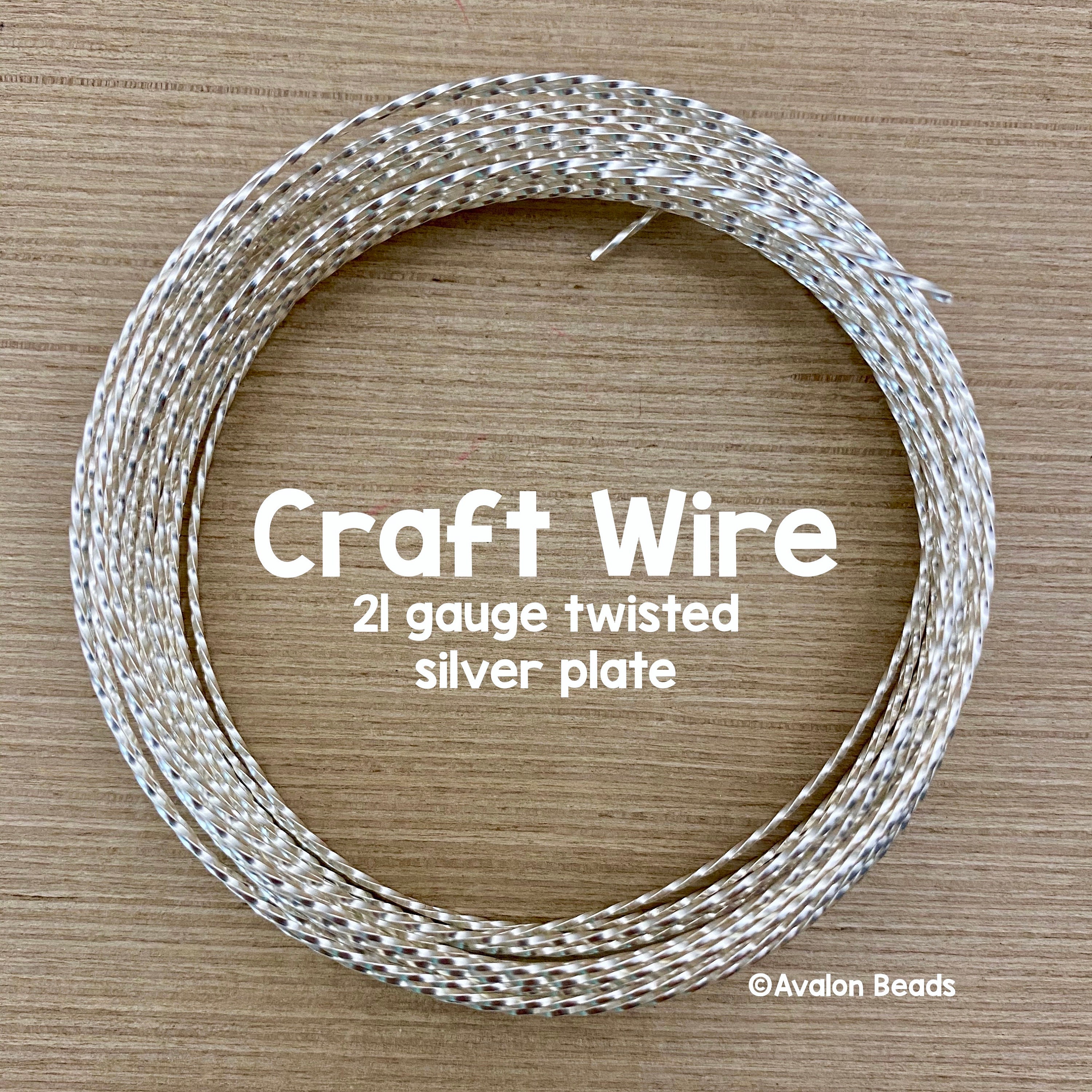 Wire, Zebra Wire™, brass, round, 18 gauge. Sold per 1/4 pound spool,  approximately 17 yards.