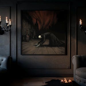 May include: A framed gothic art print depicts a skeletal figure in a long black robe, kneeling on a wooden floor. The background shows a dark, ominous scene with a building and a fiery red sky. The artwork is displayed in a dark room with candle sconces.