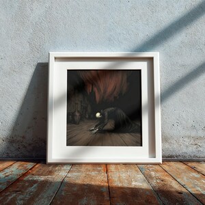 May include: A framed print featuring a dark, gothic illustration. The artwork depicts a figure with a skeletal head and long, dark robes, kneeling on a wooden floor. The background shows a cavernous space with bottles and a red, textured element.