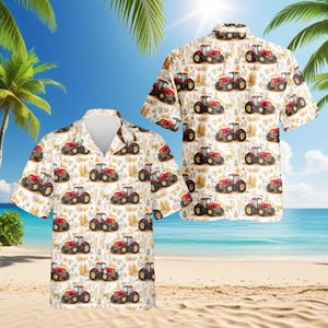 Puede incluir: Dos camisas de manga corta con botones con un patrón repetido de tractores rojos y detalles florales sobre un fondo crema. Las camisas se exhiben en una playa con palmeras y cielo azul.