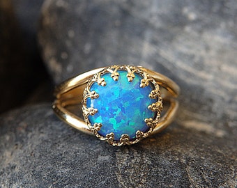 Blauwe opaal 14k gold filled ring, geboortesteen oktober