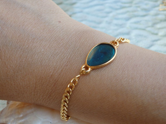 Gold bracelet deals with turquoise stone
