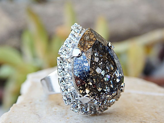 Grey crystal best sale ring