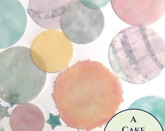 Precut edible planets and stars in heather colors for First Trip Around The Sun birthday cake decorating topper. Wafer paper cupcake topper