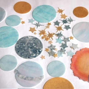 Precut edible planets and stars for First Trip Around The Sun birthday cake decorating topper. Wafer paper outer space birthday decorations.