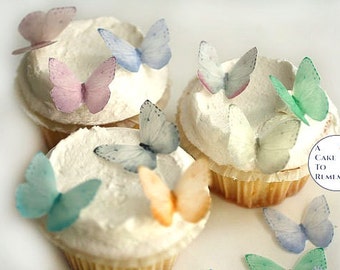 24 small pale pastels wafer paper edible butterflies for cake and cup.. 1.25" across, edible butterfly cupcake toppers set