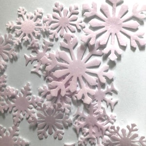 30 Edible snowflakes in pink, extra thick wafer paper for Christmas cake decorating, cupcake decorating, cookies, and winter cakes.