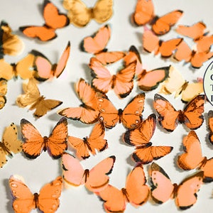 24 small mini orange edible butterflies, 1/2"- 3/4" wide. For cakes or cupcake toppers, cake pops or smash cakes, little wafer paper