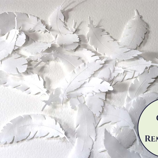 24 medium white edible wafer paper feathers in various shapes. Edible feathers for a unique wedding or birthday cake topper