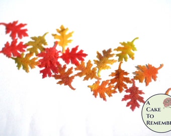 48 tiny watercolor edible autumn colored leaves for mini cupcake toppers, color on both sides .5" wafer paper. Oak leaves wafer paper