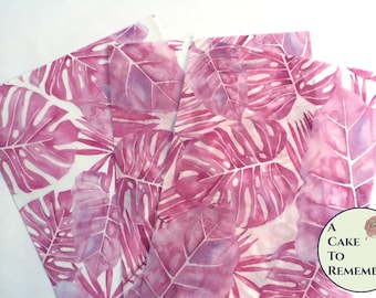 2 sheets of pink tropical palm and monstera leaf printed edible wafer paper for cake decorating. 8" x 10.5" for girl baby shower