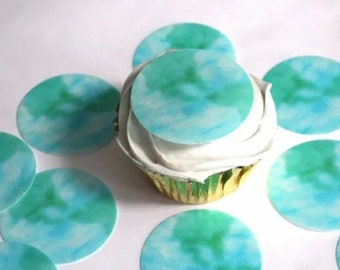 12 Precut edible planet Earth cupcake toppers. Wafer paper outer space or galaxy birthday cake decorations.