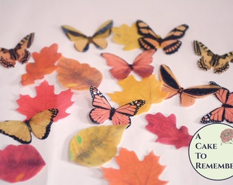 Edible leaves and butterflies set in fall colors-- 9 of each in yellow and orange tones. Rice paper cupcake toppers for autumn weddings.