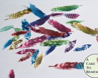 35 small edible feathers, rainbow colors. Wafer paper feathers for cupcake toppers, cookies, and cake pops.