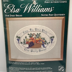 May include: Elsa Williams counted cross stitch kit, "Our Daily Bread." The design features a basket of fruit with the text "Give Us This Day" and "Our Daily Bread." Finished size is 14" x 10" (36cm x 25cm).
