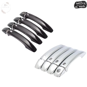 May include: A set of eight car door handle covers, with four finished in a glossy black and four in a polished chrome finish. Each handle cover features a small rectangular cutout for a keyhole or sensor, designed for exterior vehicle door handles.