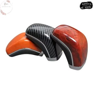 May include: A rustic wooden sign with the text "Welcome to our home" in white lettering. The sign features a distressed finish and a simple, inviting design, perfect for entryway decor.