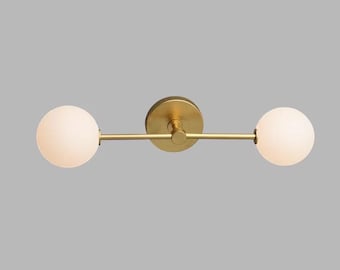 Brass Vanity Sconce: Mid-Century Modern Wall Light with Milk Glass Globes