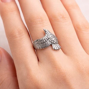 Handgemaakte zilveren wikkelring met vogel – verstelbare uniseks statement sieraden