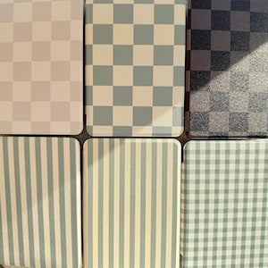 May include: Six square and rectangular items with various patterns. Top row features checkered patterns in beige, light blue, and dark gray. Bottom row has striped and gingham patterns in light blue and green.