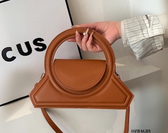 Borsa a mano circolare alla moda, borsa a tracolla minimalista in tinta unita per donna, moderna borsa a spalla rotonda per la spesa