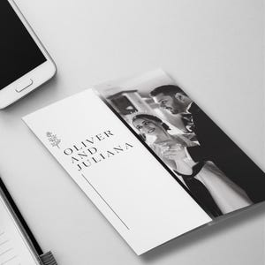 May include: A black and white wedding invitation featuring a photograph of a couple dancing. The invitation has the names "Oliver and Juliana" printed in black, along with a decorative floral element and a vertical line.