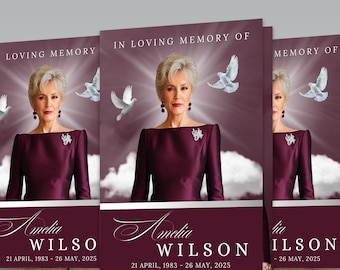 May include: Memorial cards featuring a portrait of a woman in a burgundy dress, with the text "In Loving Memory Of" and the name "Amelia Wilson" along with dates. White doves and a soft light effect are in the background.